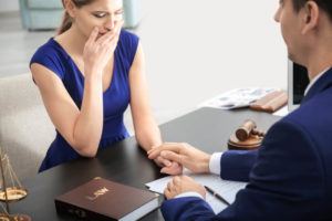 Wife consulting wrongful death attorney.