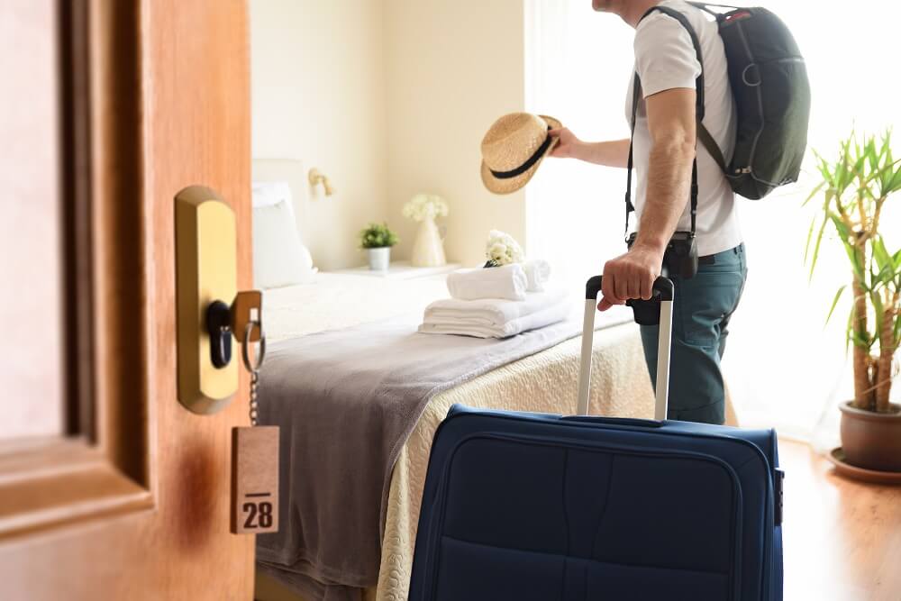 Tourist checking in airbnb room.